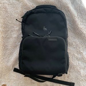 Black Brevite Jumper Camera Backpack.